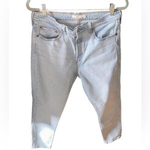 Levi size 32 high rise wedgie , light wash. Button fly , Worn twice.
